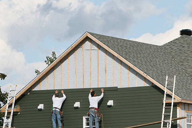 Professional Storm Damage Siding Repair technician working in Blaine, WA